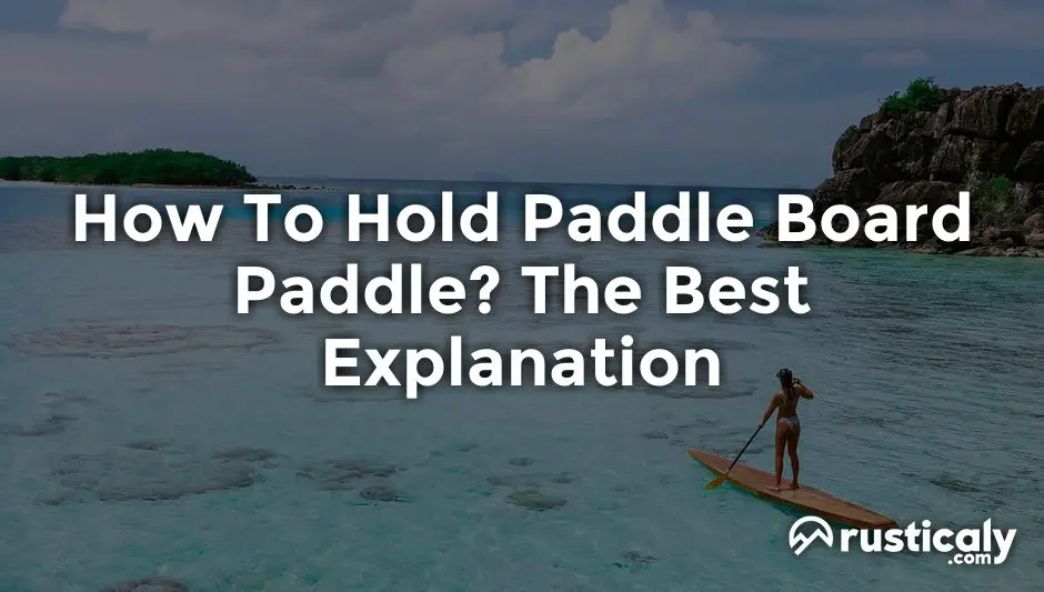 how to hold paddle board paddle